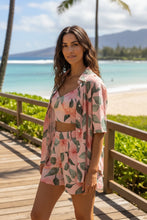 Load image into Gallery viewer, Isla Botanica Shorts styled with coordinating crop top and blouse
